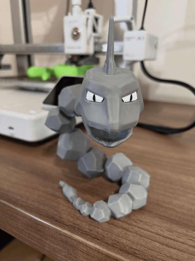 Onix impresso em 3D, peça articulada em cinza